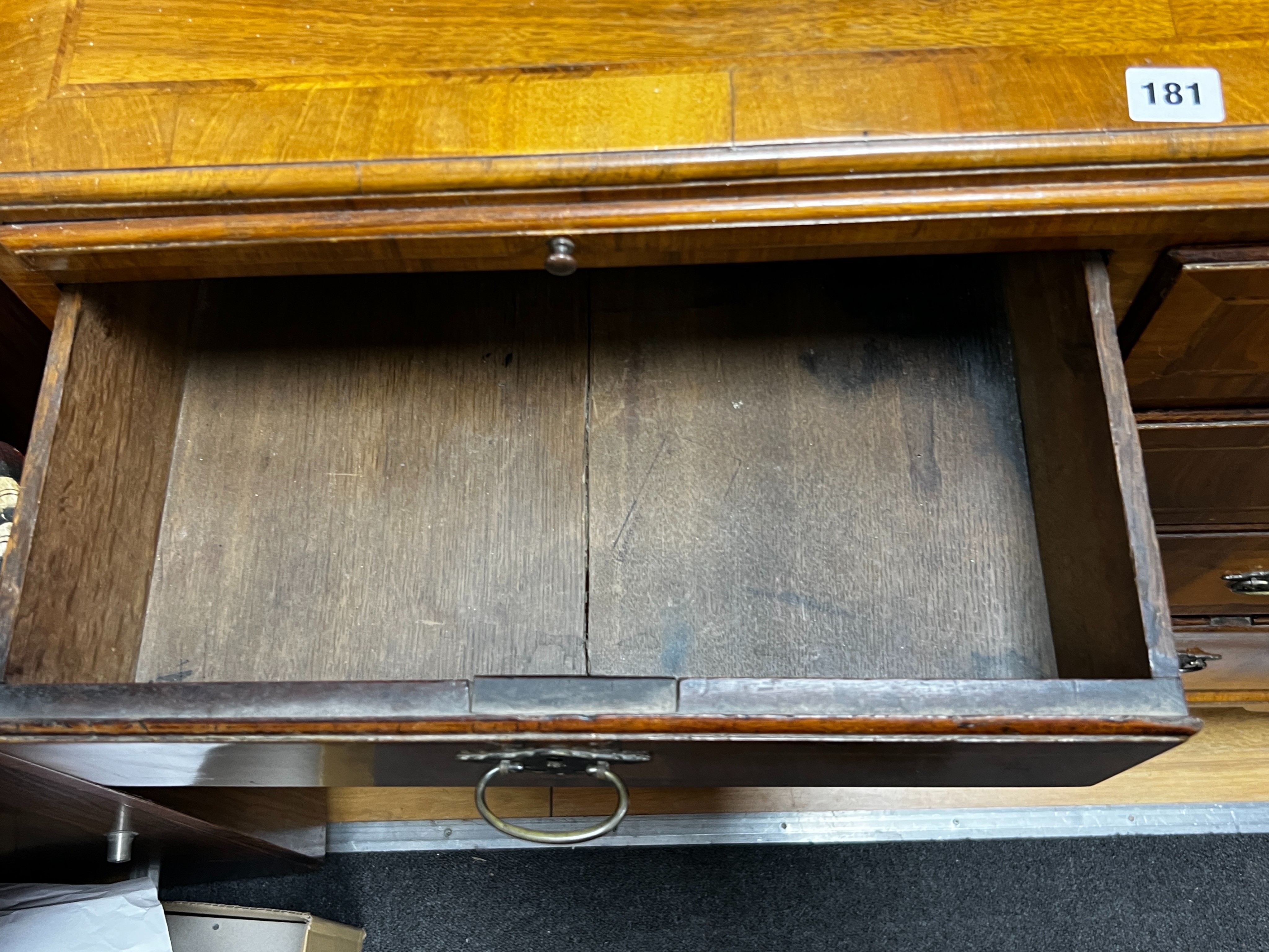 A Queen Anne revival feather banded walnut cabinet on chest, width 91cm, depth 47cm, height 193cm